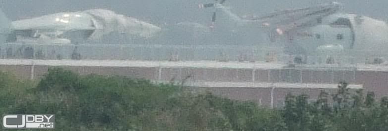 http://i988.photobucket.com/albums/af8/My-Military-Photos/PRC/Sea/Aircraft%20Carriers/Unknown_2.jpg